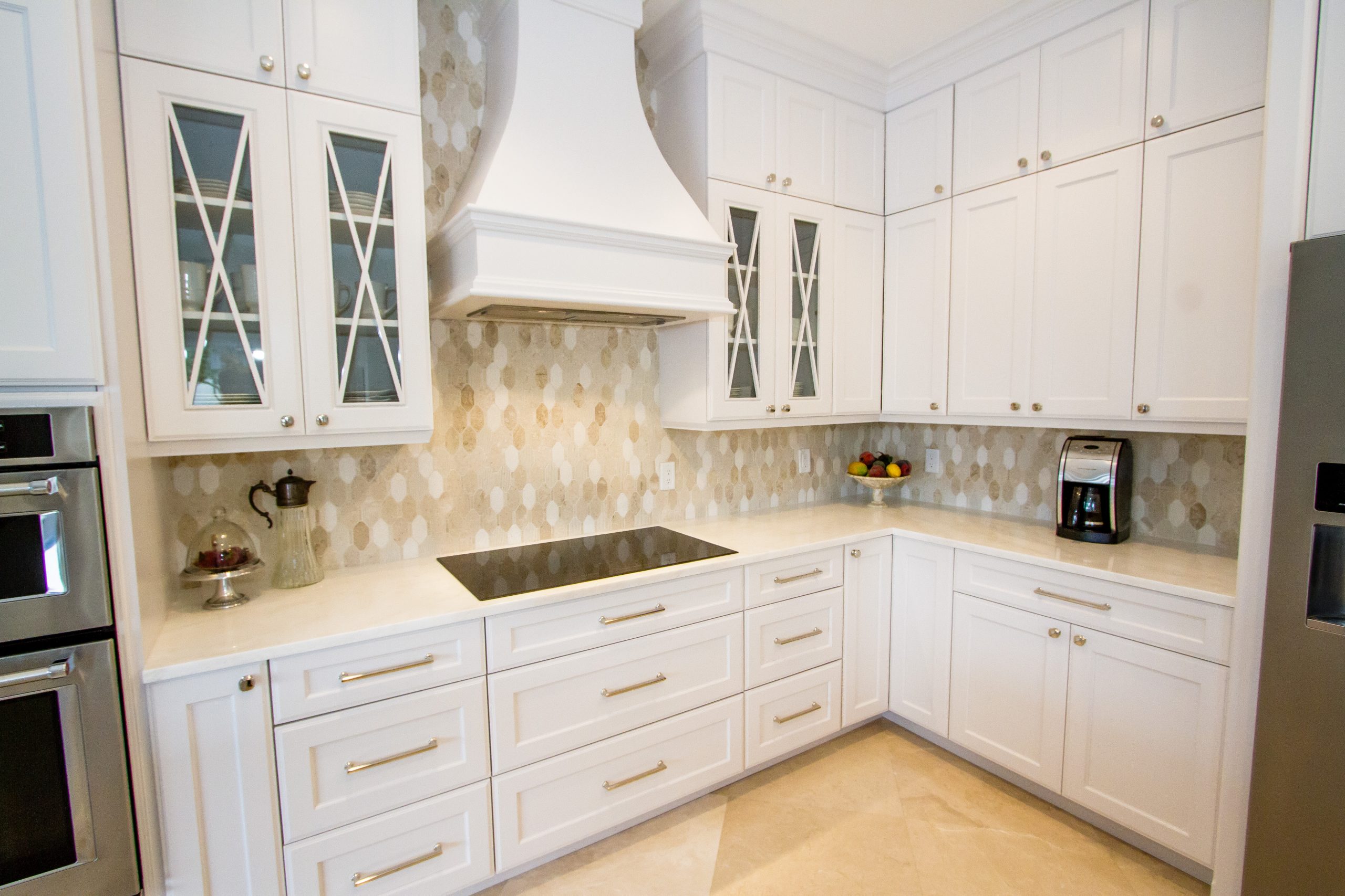White marble kitchen countertops with oven vent