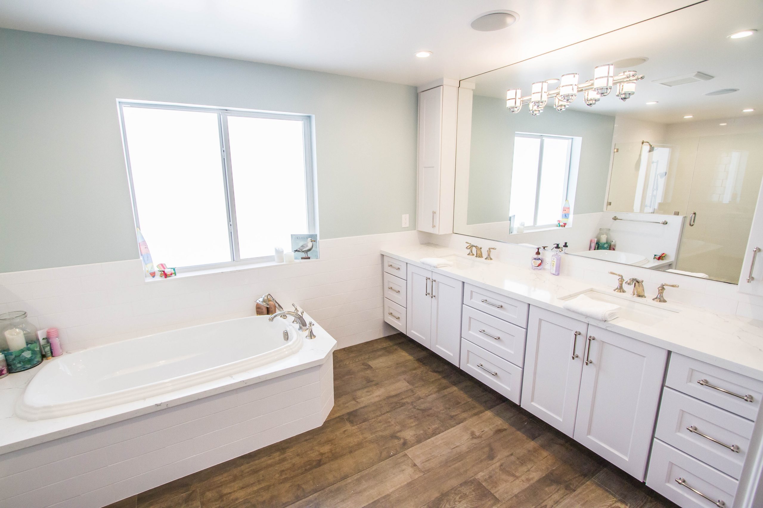 Double bathroom vanity with white marble countertops