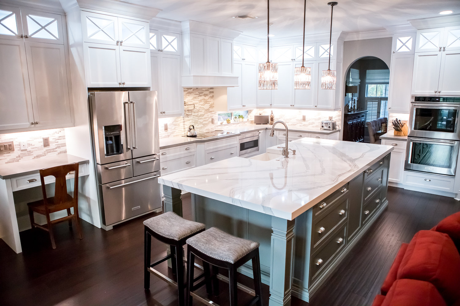 White marble countertops throughout kitchen