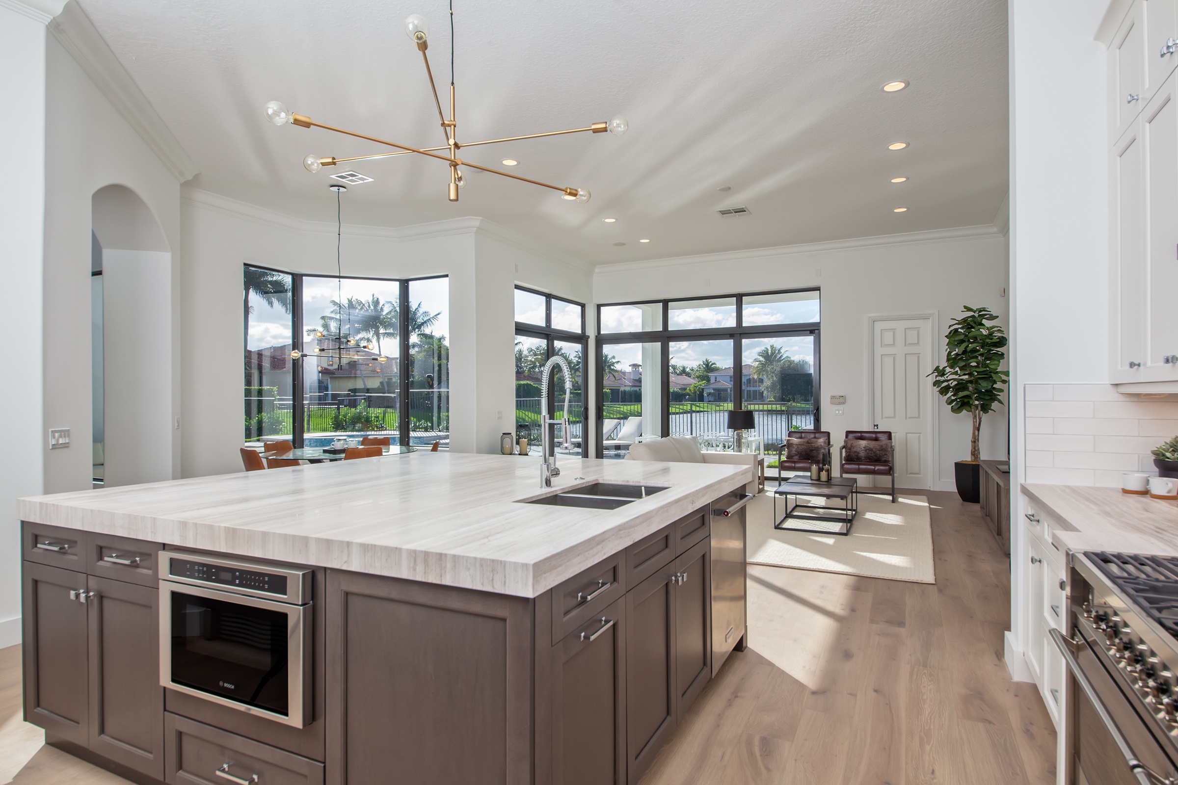 White marble kitchen island with sink