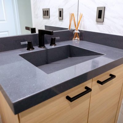 Black granite countertops installed in a Boca Raton bathroom 