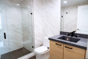 Black granite countertops installed in a Delray Beach bathroom